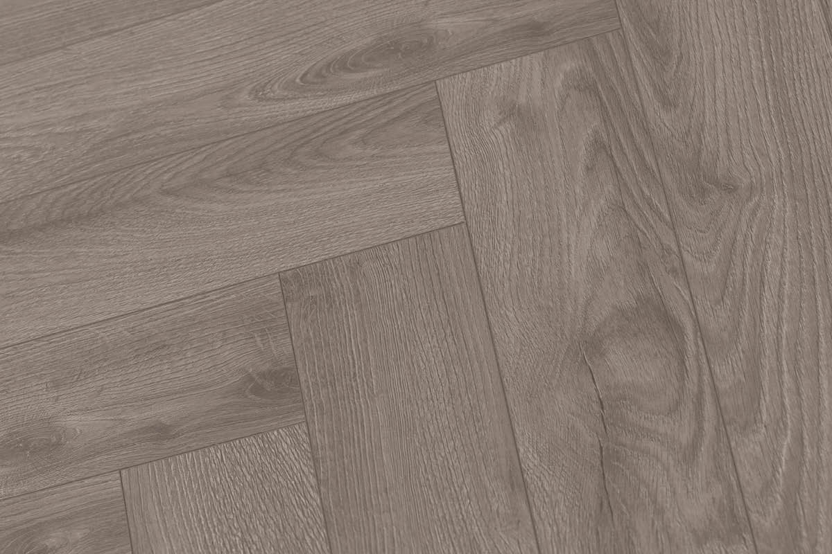 Series Woods 8mm Herringbone Laminate Flooring  Sterling Grey Oak
